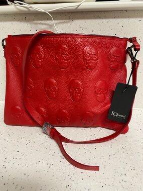 NWT.  IOdessa, red leather, skull handbag.